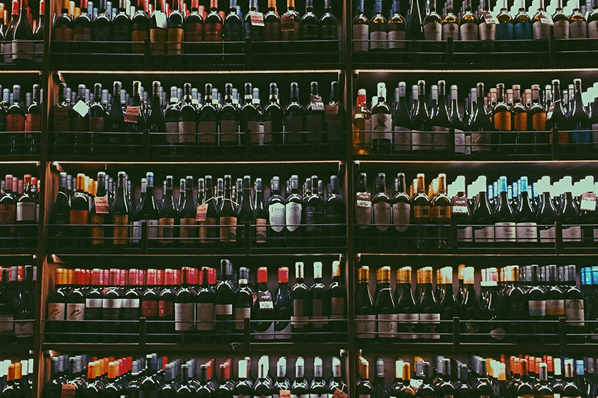 Illustration of wine racks in a shop-warehouse for an article on wine importing